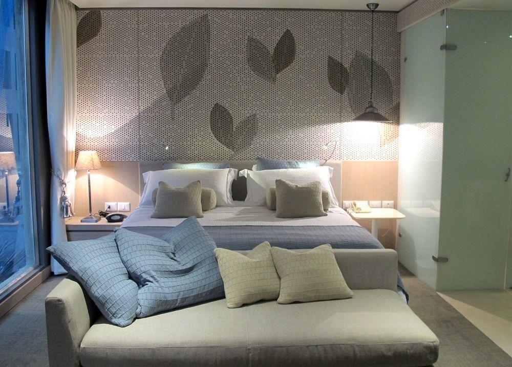 Hotel Nh Collection Bogota Terra 100 Royal Extérieur photo A bedroom at the hotel